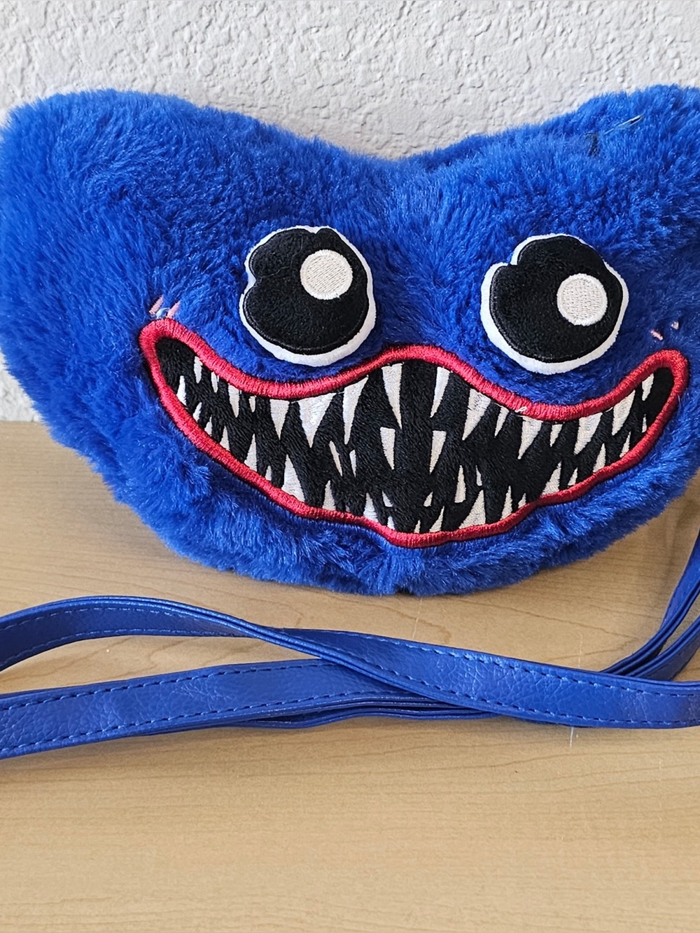 Huggy Wuggy cross body purse from the Poppy Playtime horror game.